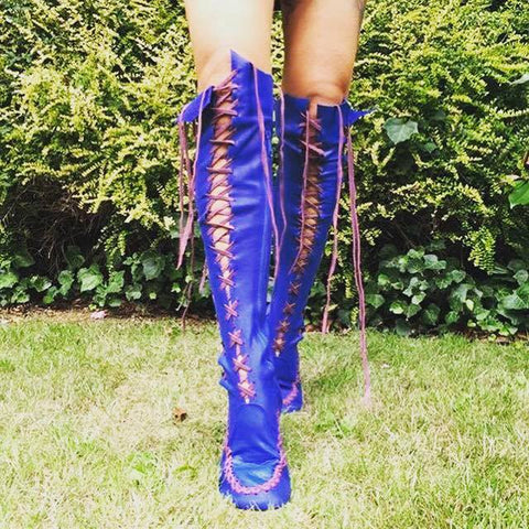 Cobalt  knee high boots with plum laces