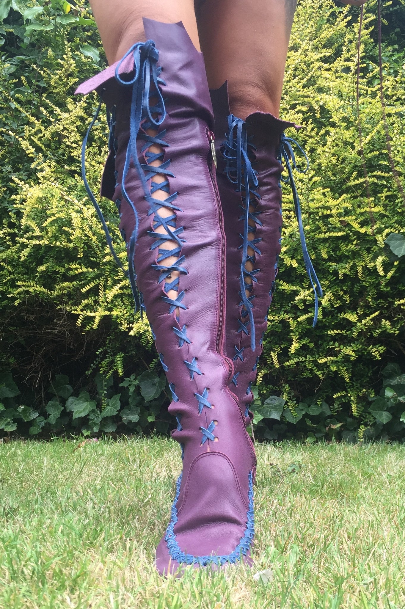 Plum knee high boots with cobalt laces