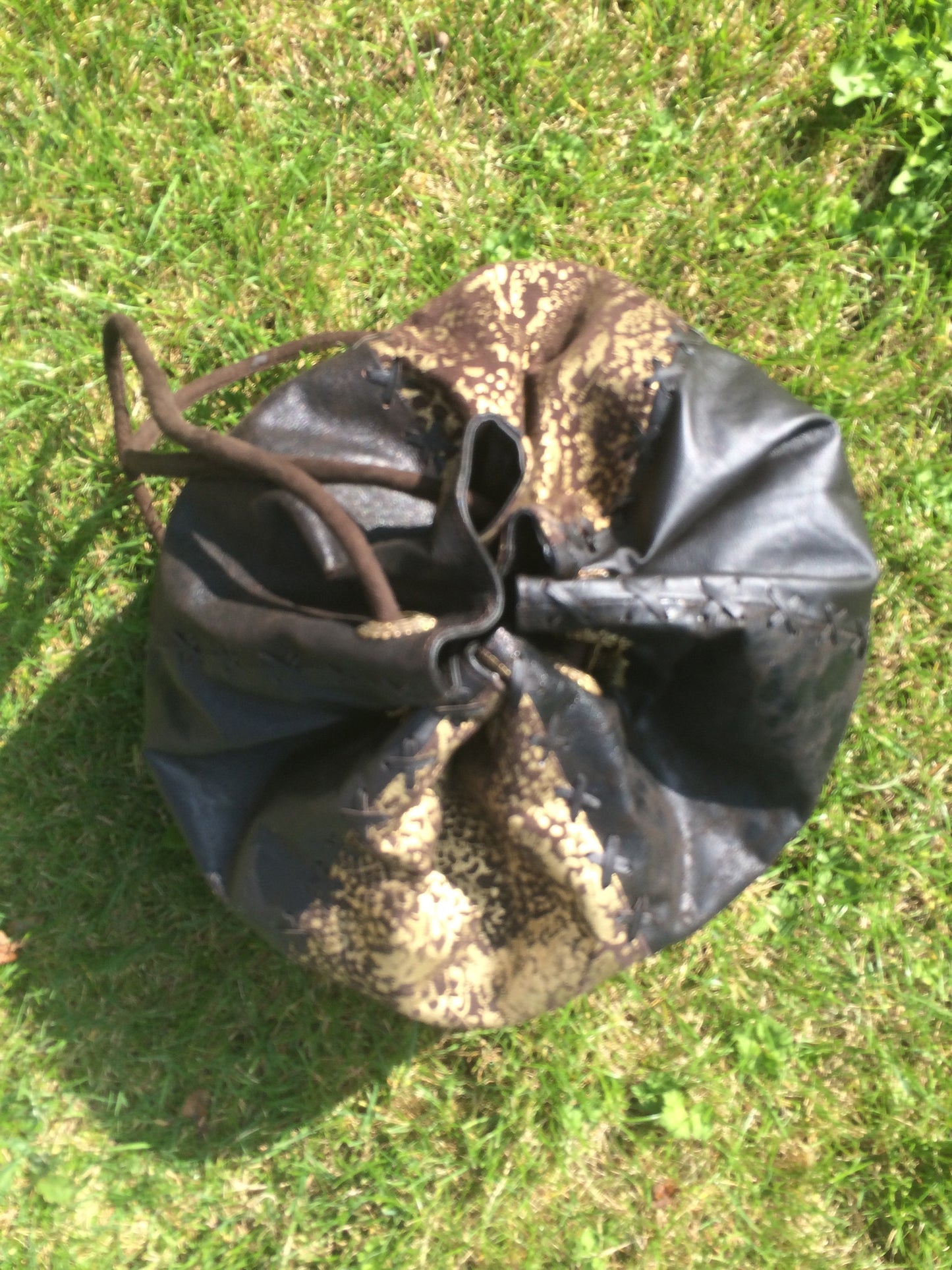 Serpent print Leather String Hand Bag and Rucksack