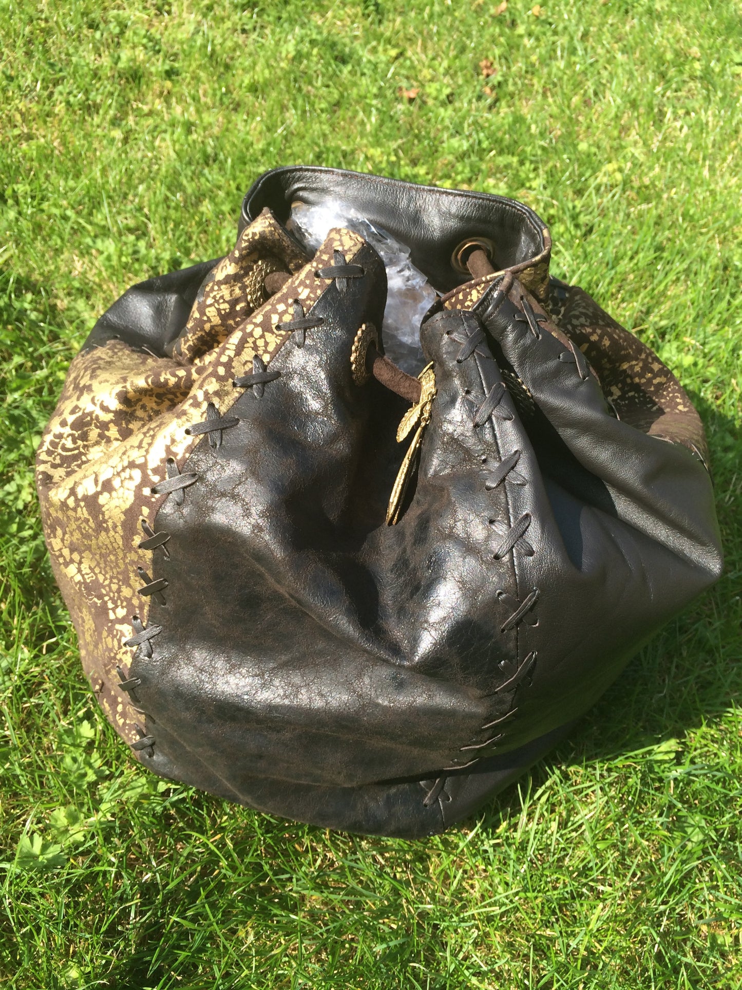Serpent print Leather String Hand Bag and Rucksack