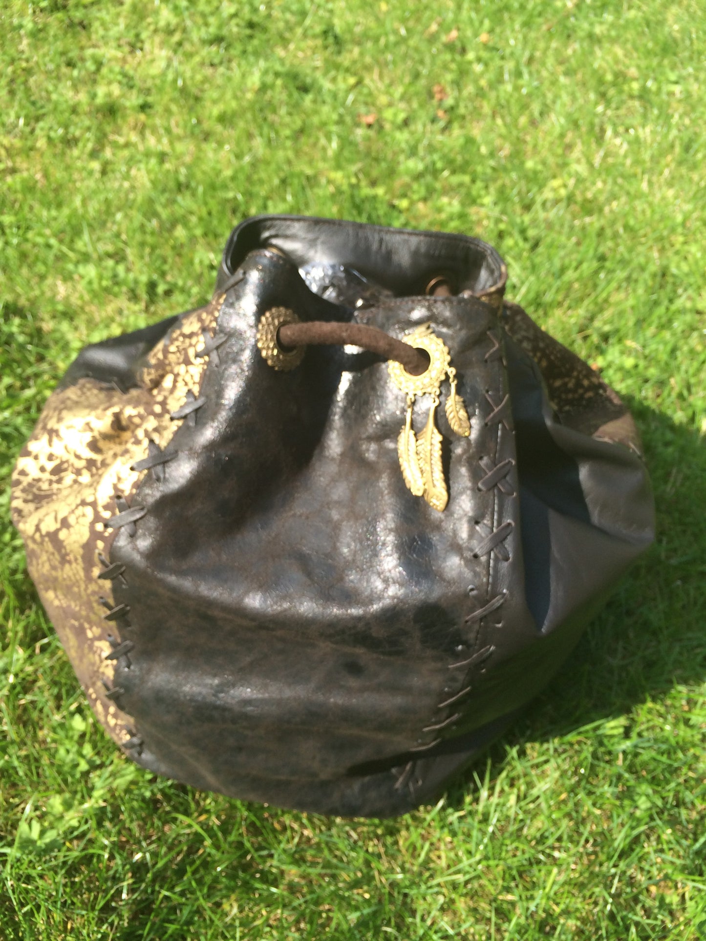 Serpent print Leather String Hand Bag and Rucksack