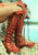 Orange knee high leather boots for women