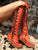 Orange knee high leather boots for women